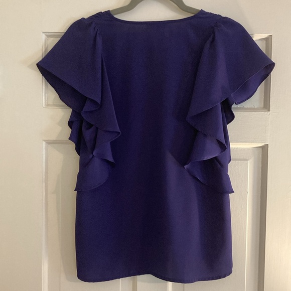 Aqua size small purple top with ruffle sleeve. EUC, from Bloomingdale’s - Picture 3 of 3